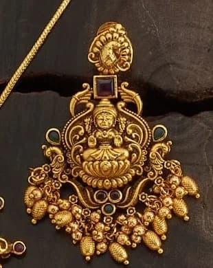 Temple earring with Lakshmi motif and gold bead drops