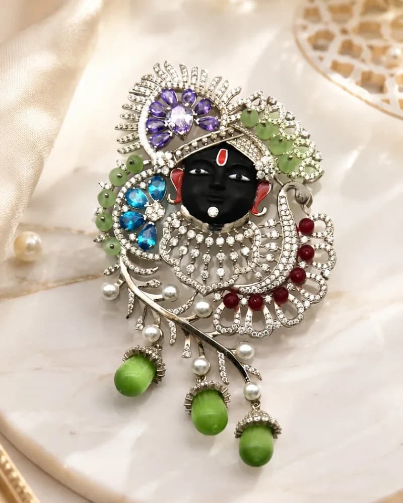 Silver Shrinathji pendant set with coloured stones and pearls